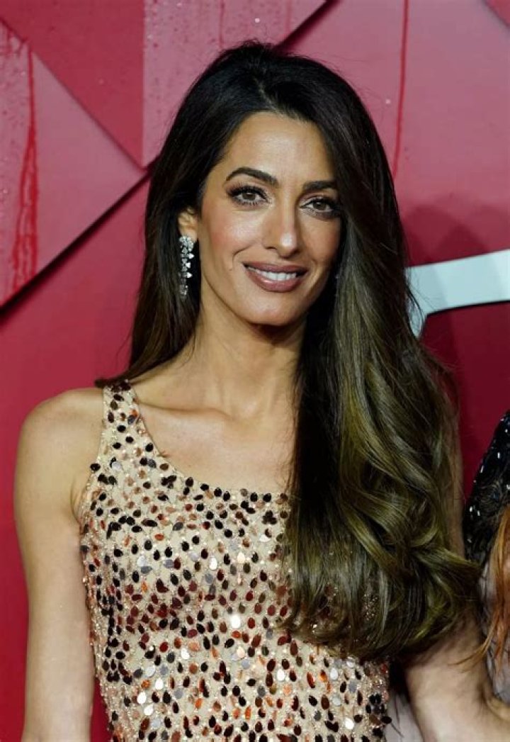 Amal Clooney Is Dazzling in a Yellow Sequined Minidress While in London