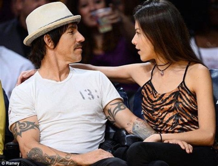 Anthony kiedis sits between porn star and girlfriend at lakers game