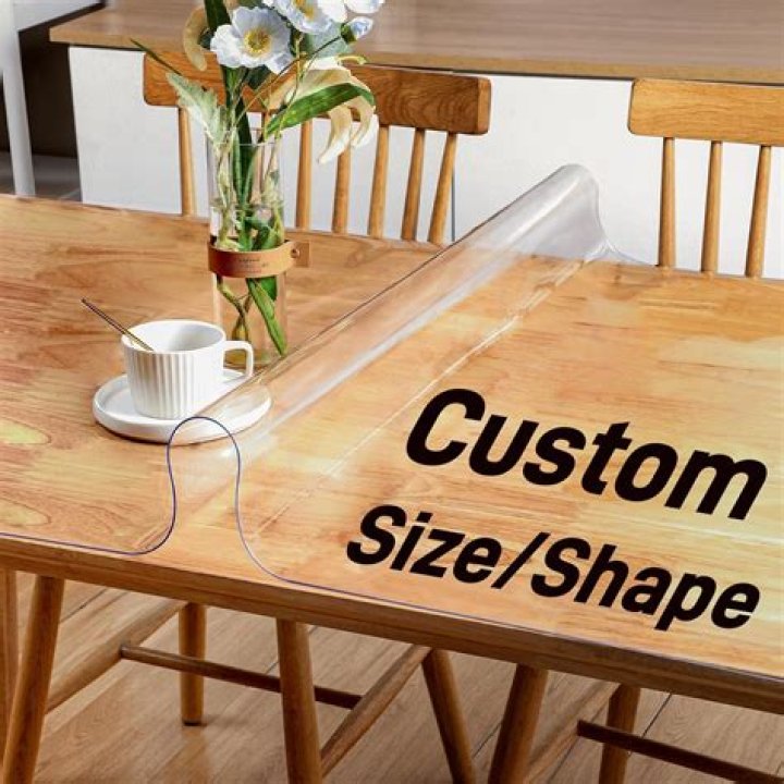 How do you cover or protect glass on a table?
