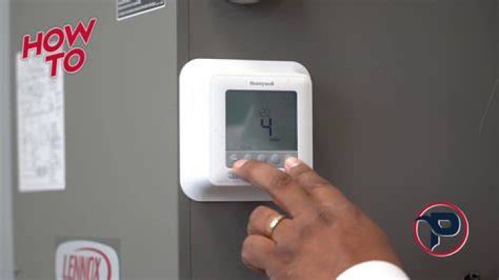 How do you unlock a locked Honeywell thermostat?