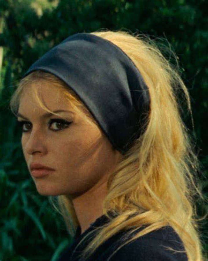 Image of Brigitte Bardot withGunther Sachs and his son Rolf in Gstaad,