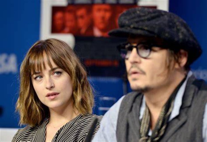 Is Johnny Depp Dakota Johnson's godfather?