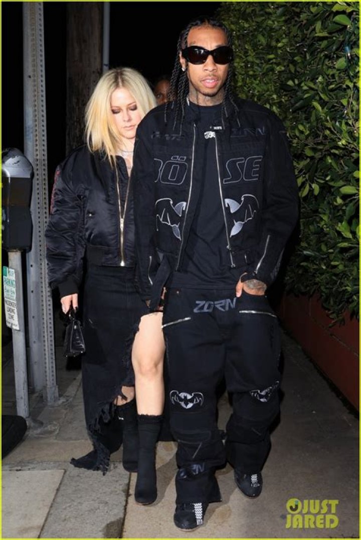 Latest Celebrity Tyga & Avril Lavigne Spotted Hugging At NOBU &mdash; Sources