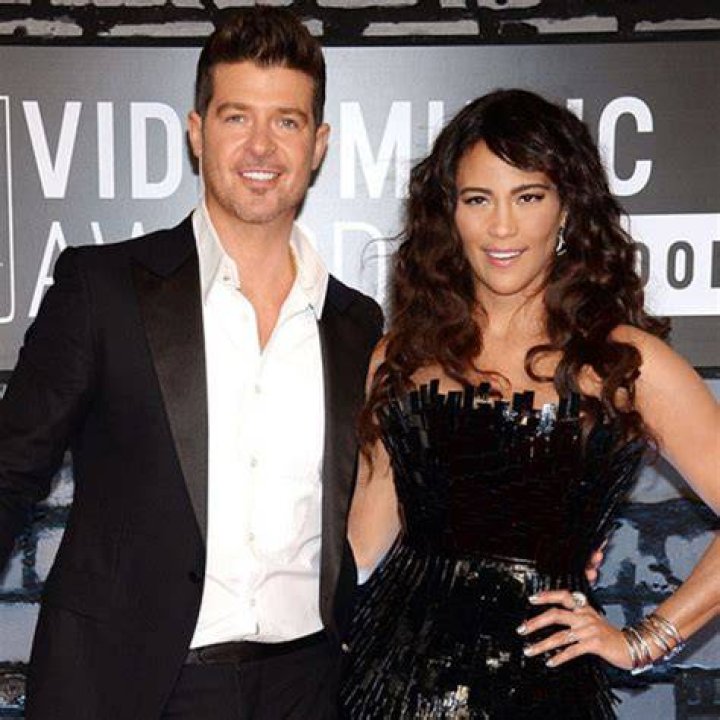 Robin Thicke, Paula Patton Had a ThreeWay Relationship With Masseuse