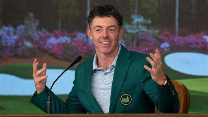 Sport Rory McIlroy and CBS sports journalist Amanda Balionis spark