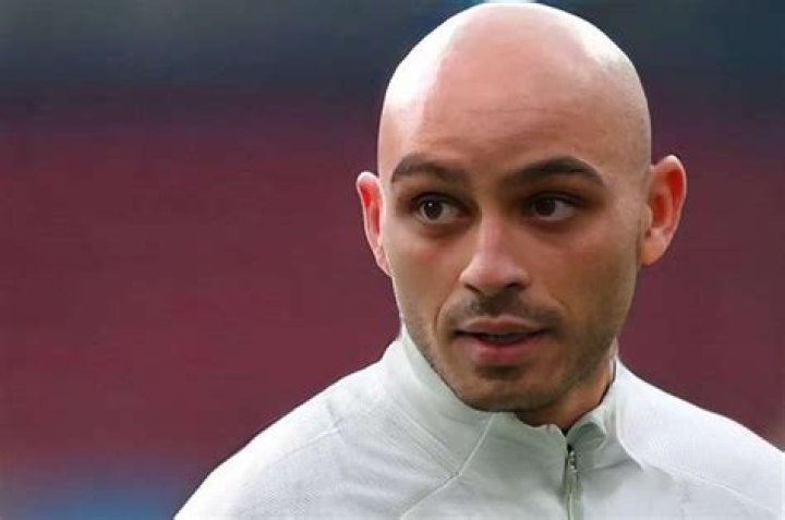 Uncovering The "Bald Barcelona Player" Mystery