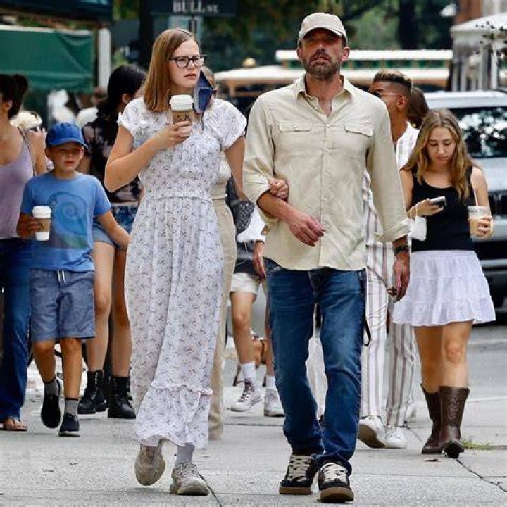 Violet Affleck, 17, stuns in white summer dress at elite July 4