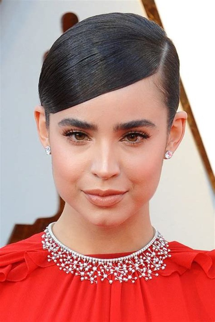 Why is Sofia Carsons hair tucked in?